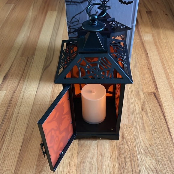 Halloween Lantern - 7.1”Lx7.1”Wx15.2”H. Includes LED candle with auto timer. - Picture 6 of 9